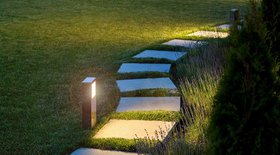 After landscape lighting installation you can safely walk along the garden pathway during the night